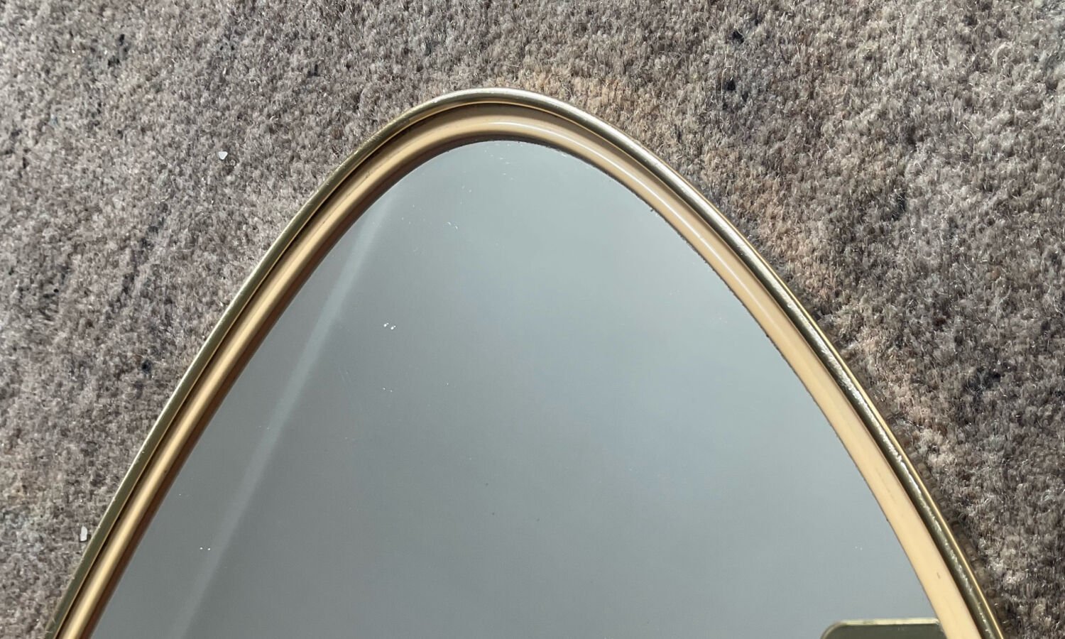Asymmetrical free-form mirror from the 60s-70s.