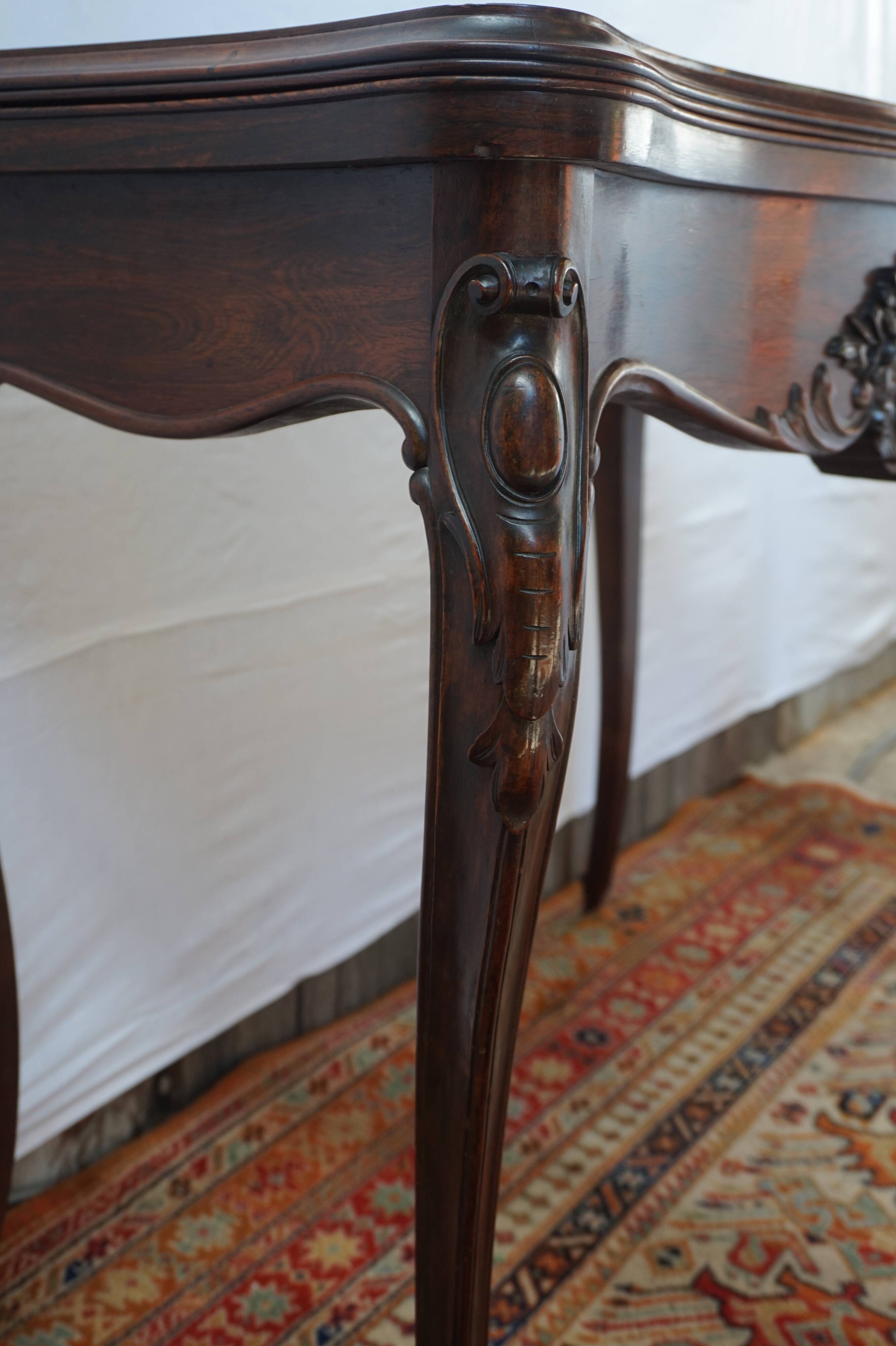 A XIX rosewood games table