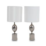 Paire de lampes en laiton argenté. Années 1970.