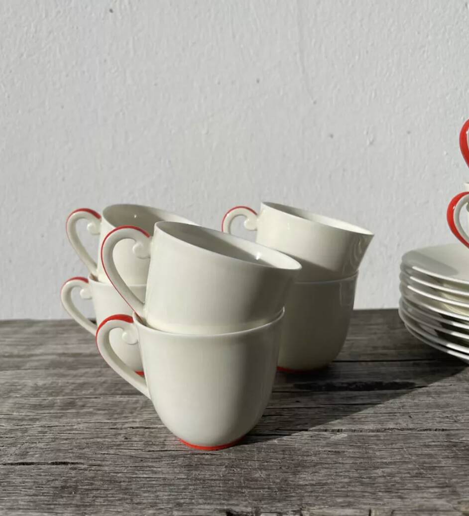 8 tasses en porcelaine fine blanche de Limoges Art déco