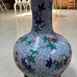 CHINA Polychrome porcelain vase decorated with butterflies Signed under the base 43cm