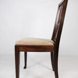 Set of four dining room chairs in rosewood and upholstered with light fabric, 1920s