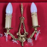 Pair of Louis XVI style wall lights, gilded bronze