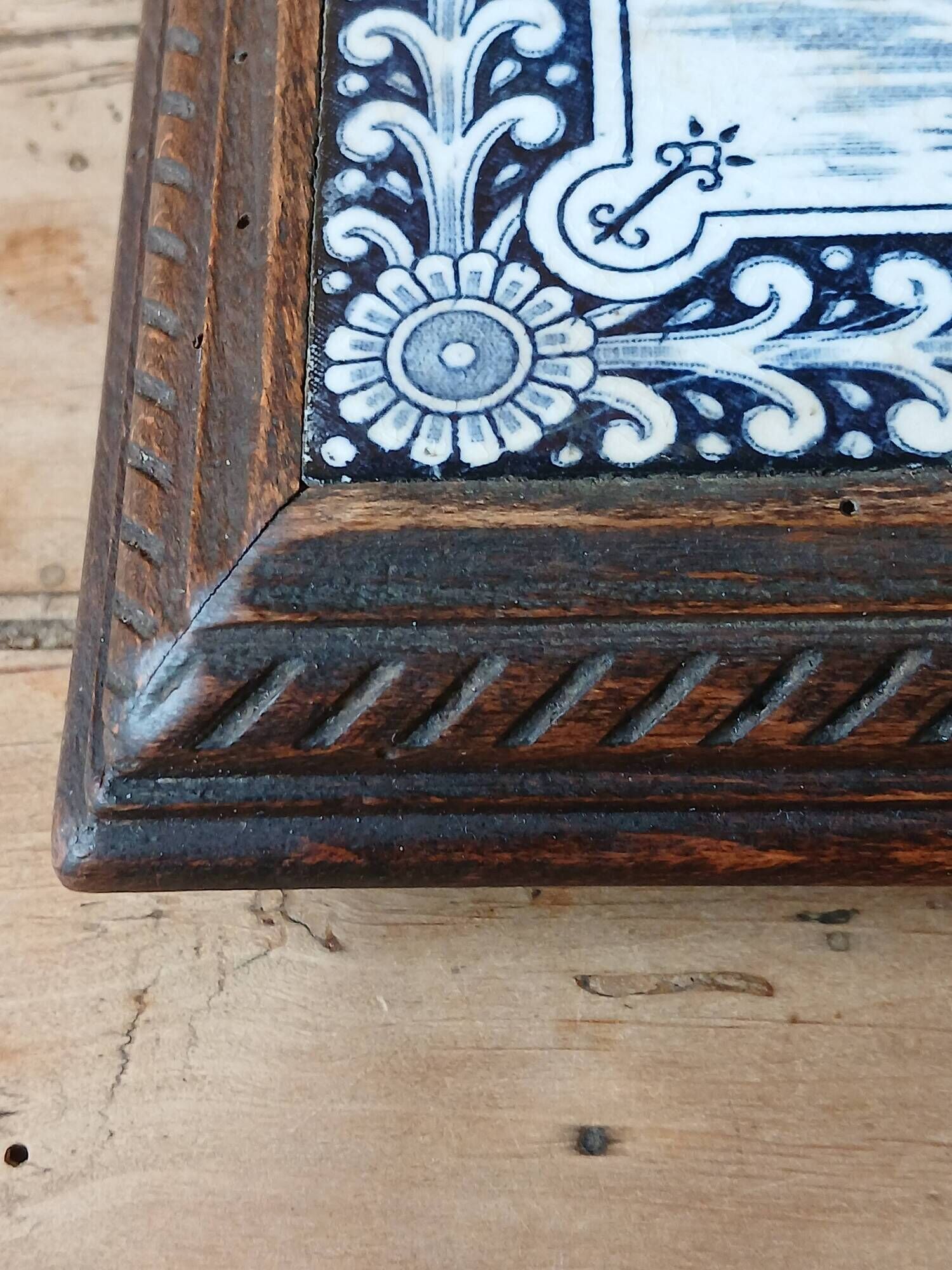 Ceramic tile trivet and wooden frame with Dutch windmill.