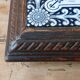 Ceramic tile trivet and wooden frame with Dutch windmill.