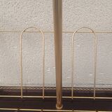 1960s brass folding magazine rack with lacquered wood decoration.