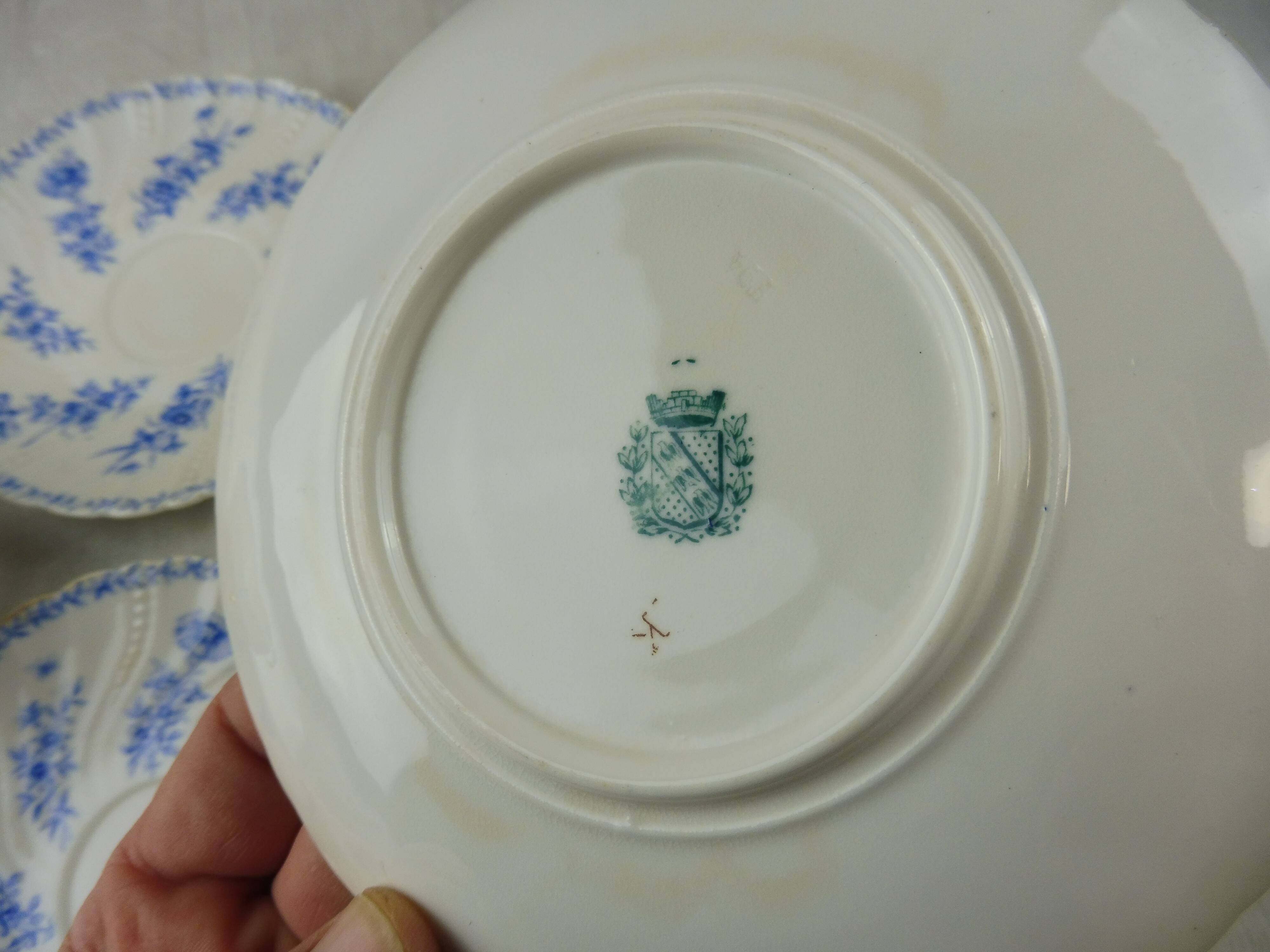 Lot of porcelain cups and under cups, twisted decoration, from Sarreguemines