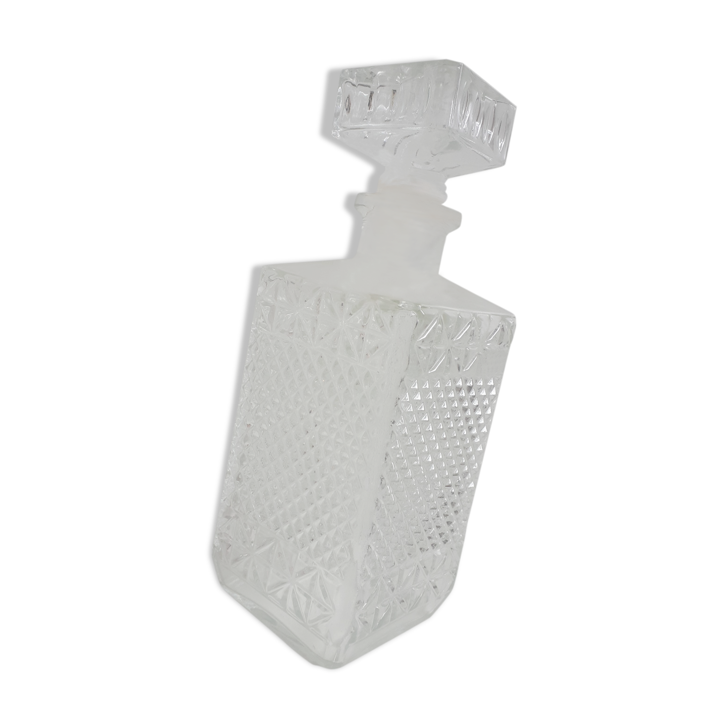 Old whisky carafe in relief glass