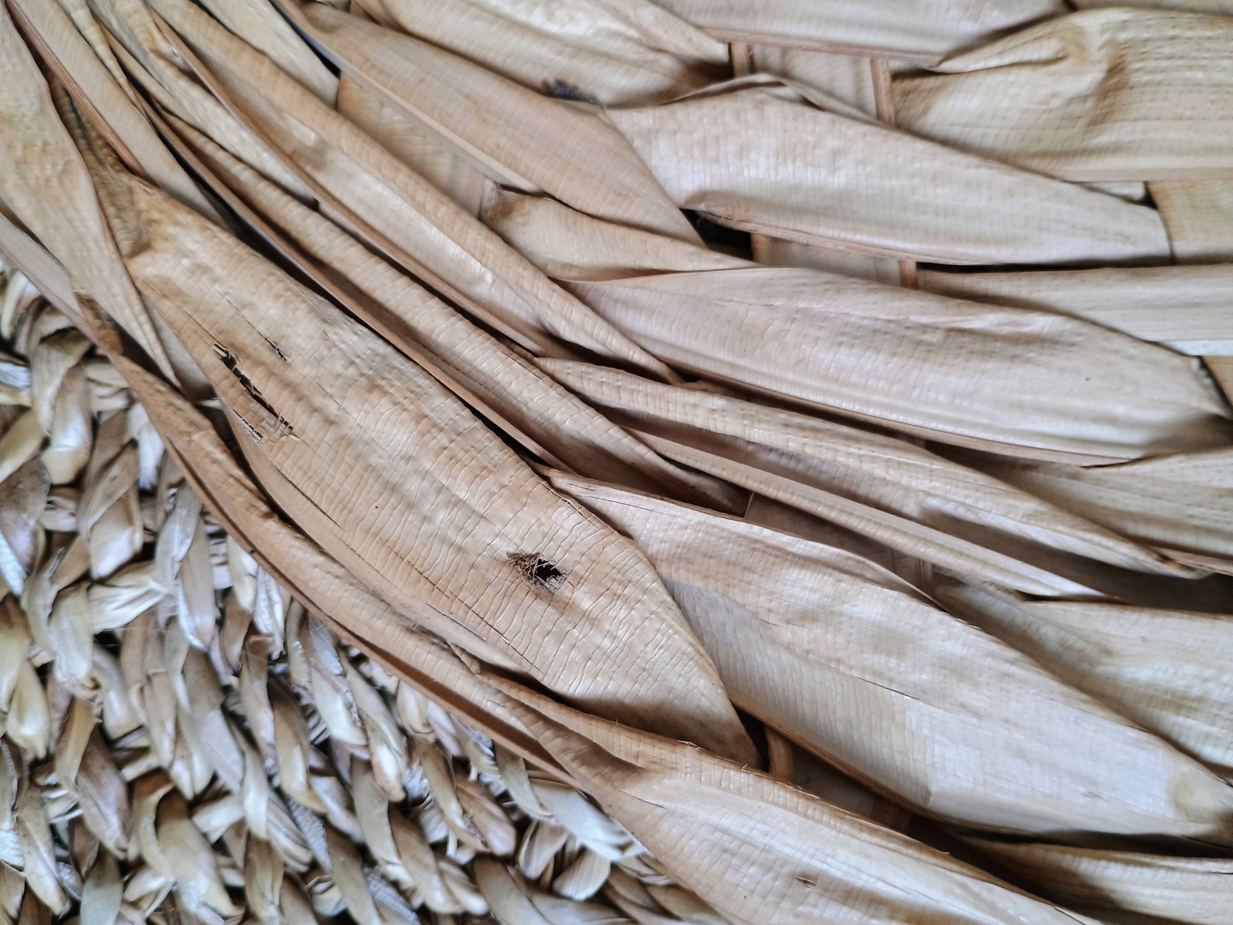 Heart fan in vintage woven palm leaves
