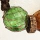Fishing floats made of blown glass, cork, and rope. France, 1960s.