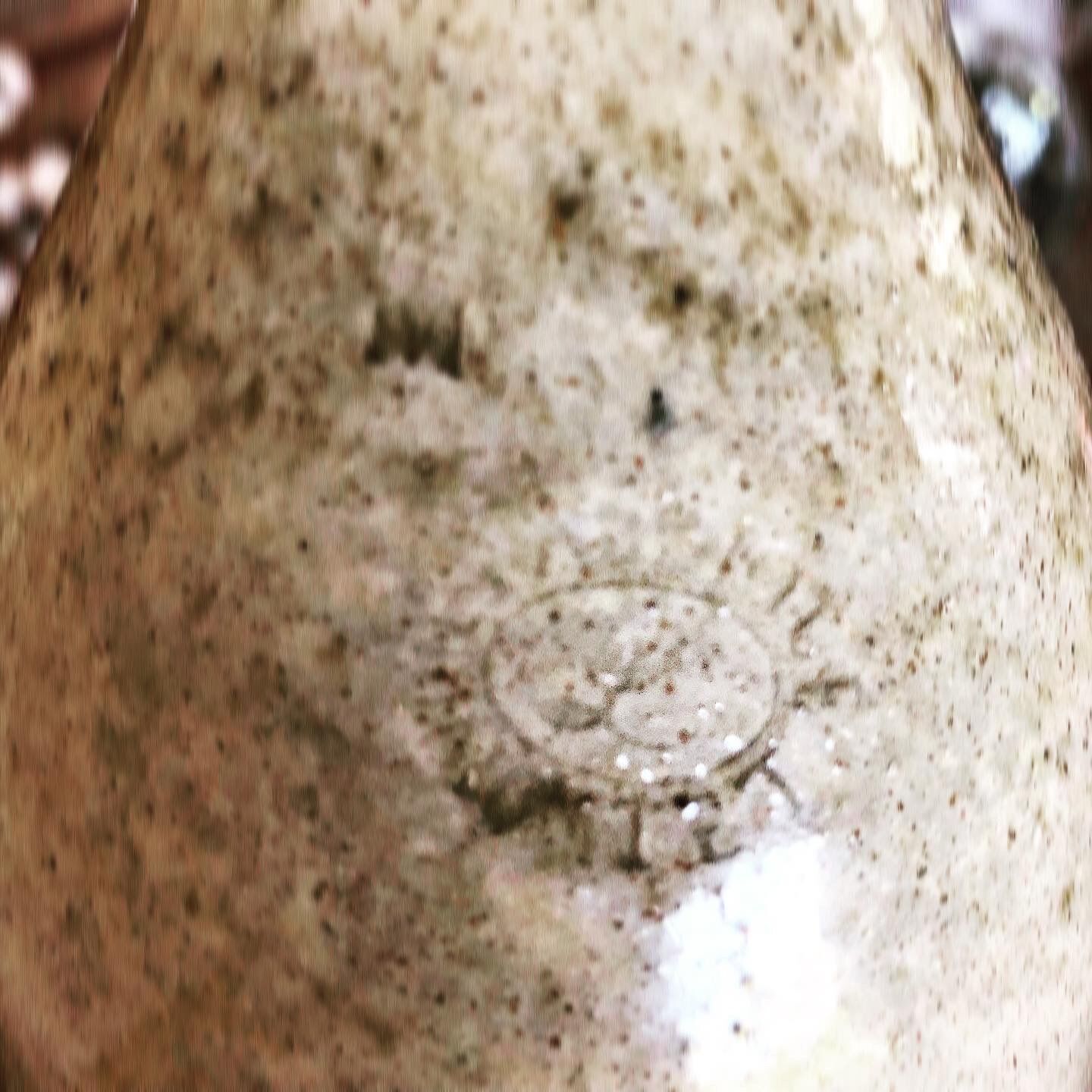 Stamped terracotta bottle