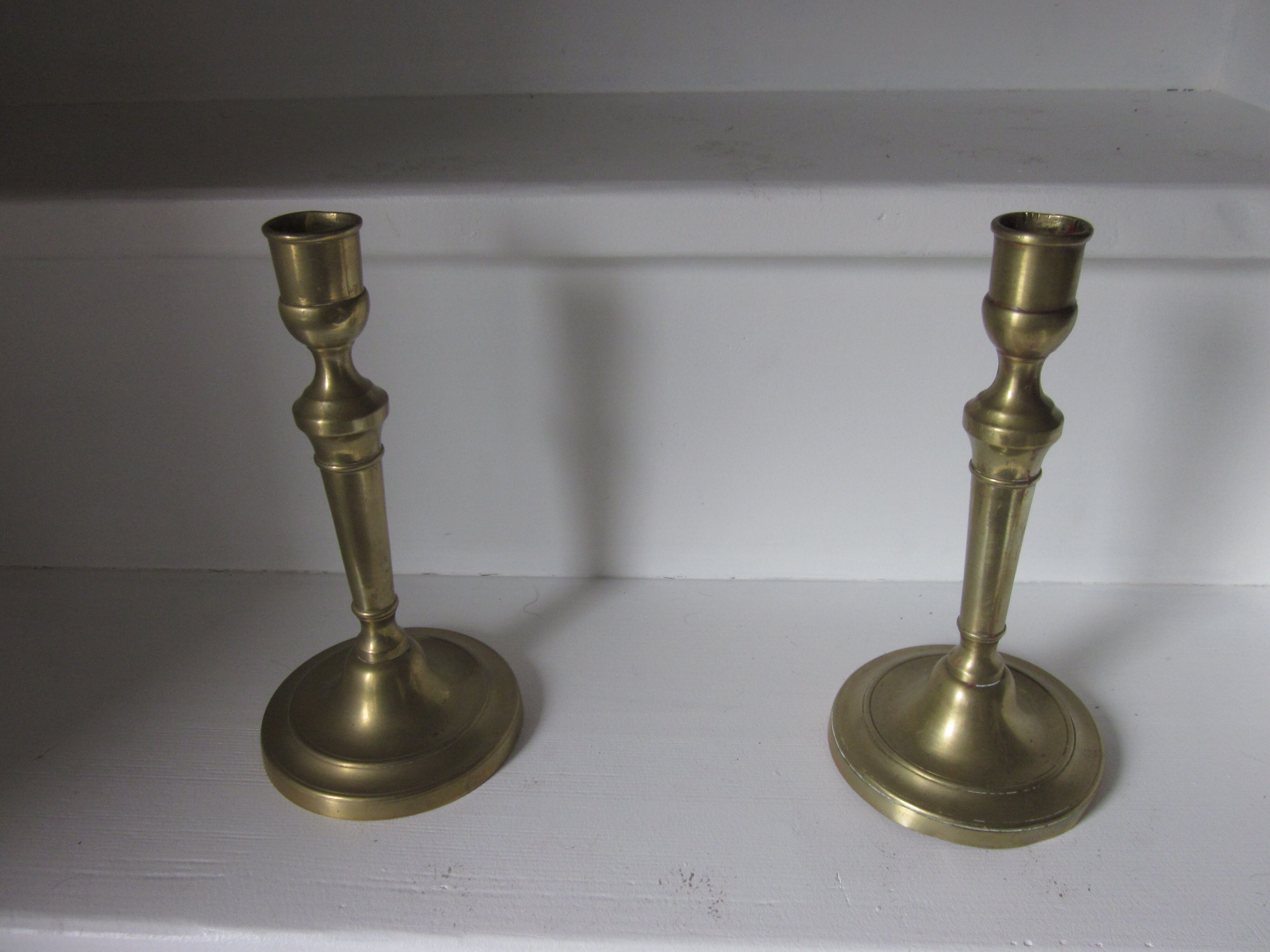 Pair of old bronze candlesticks