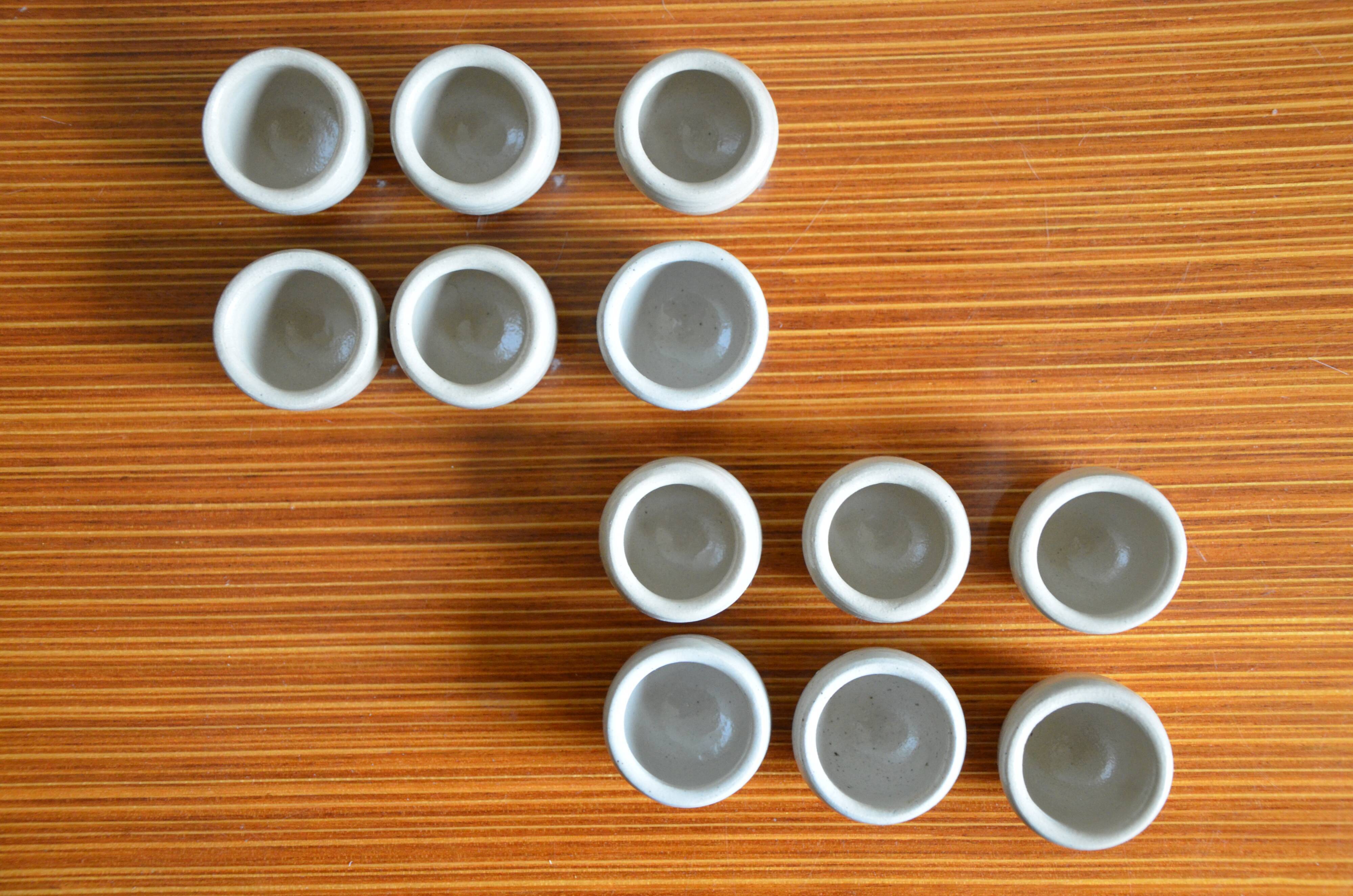 Lot of 12 grey sandstone snail buckets