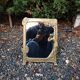 Art Nouveau mirror in gilded brass with a woman figure emerging from a vintage frame