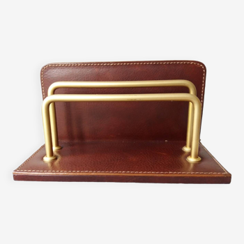 Letter holder covered in leather and golden metal by roche design