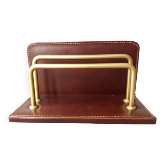 Letter holder covered in leather and golden metal by roche design