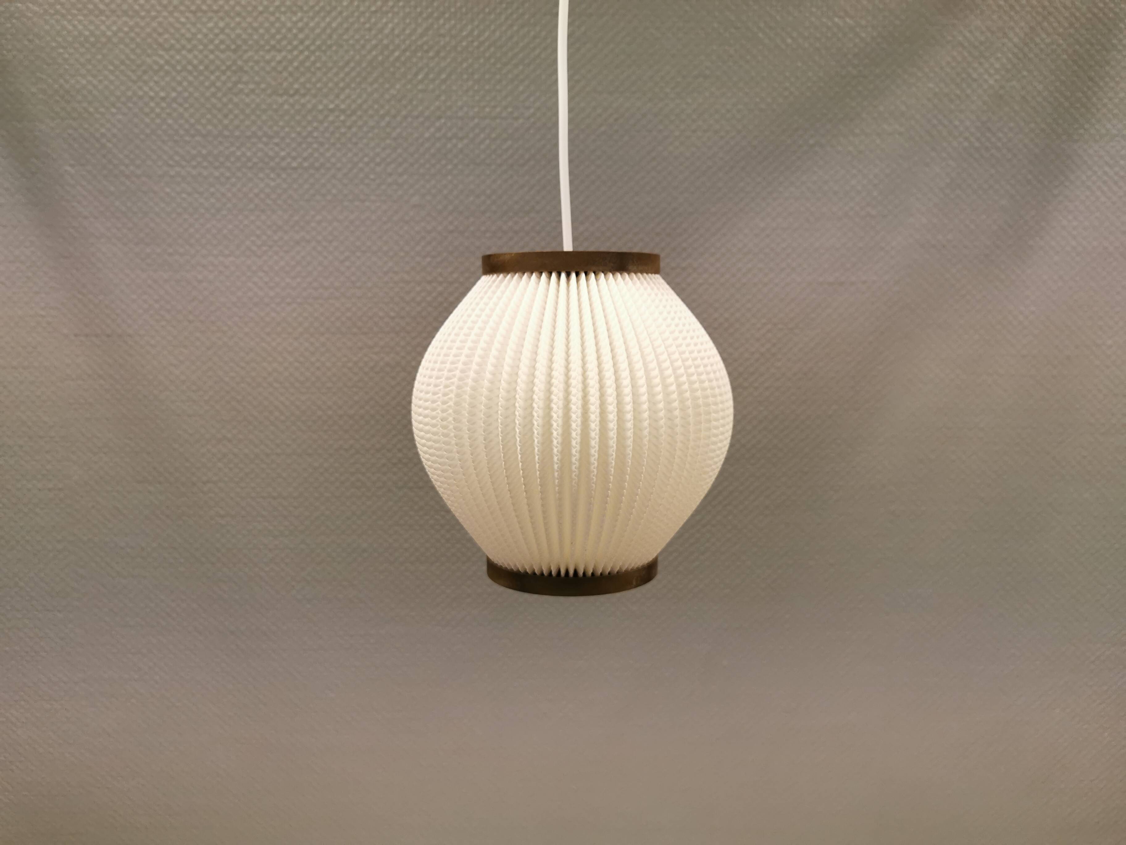 Pleated hanging lamp model Pearl Shade, produced by Hoyrup Light and designed by Lars E Schøiler