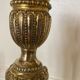 Pair of Louis XVI torch candlesticks in gilded bronze