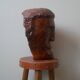 Sculpture en bois tête homme ethnique fabrication artisanale objet de décoration tribal atelier