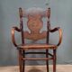 Curved wooden armchair Kohn