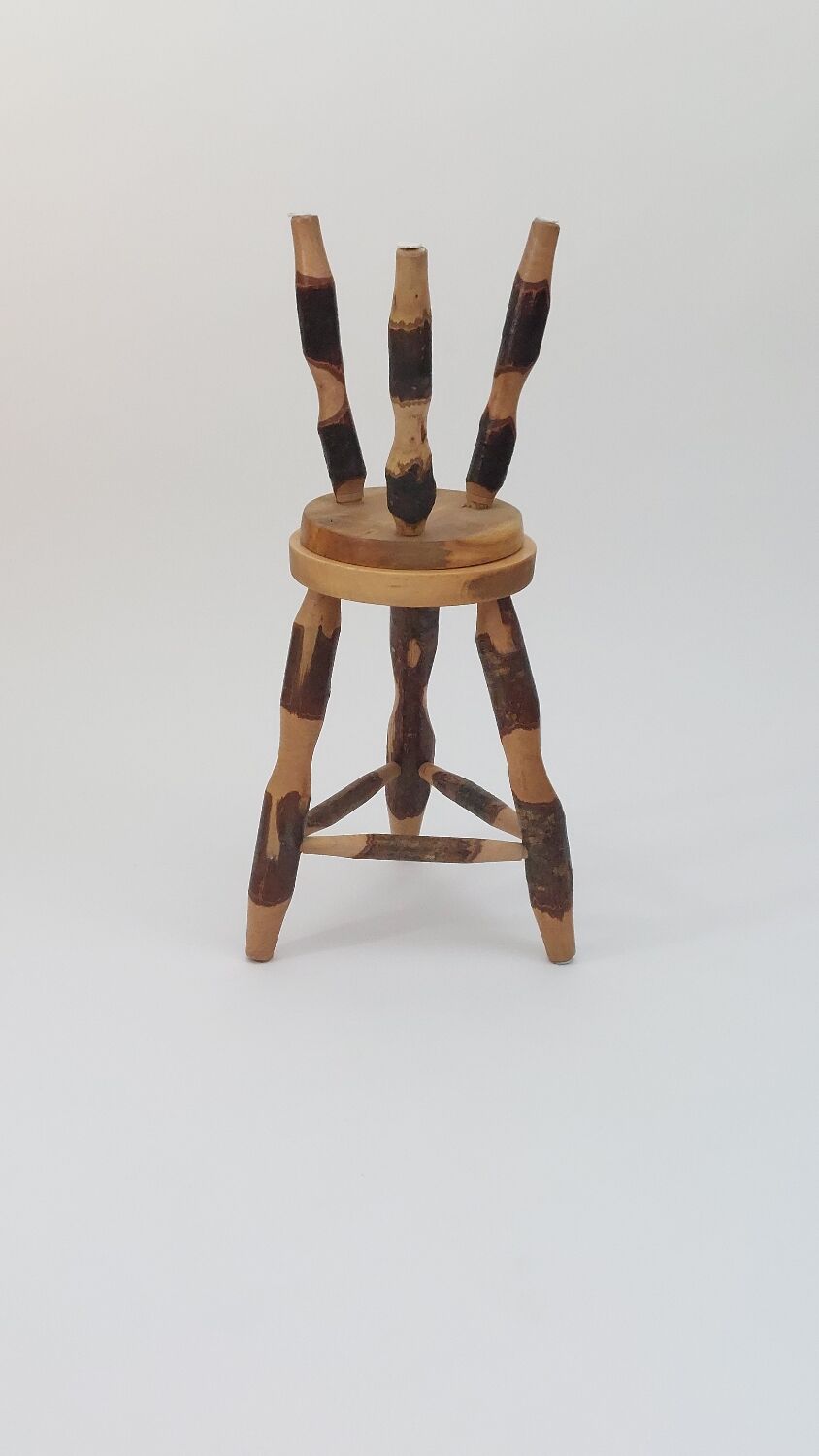 Pair of walnut stools sculpted in a vintage mid-century cross-section.