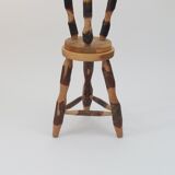 Pair of walnut stools sculpted in a vintage mid-century cross-section.