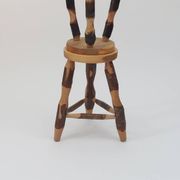 Pair of walnut stools sculpted in a vintage mid-century cross-section.