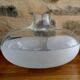 Glass flattened belly ball vase