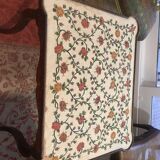 Table with tapestry
