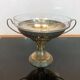 Art Deco brass cup and its engraved saucer.