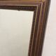 Miroir encadré en bronze