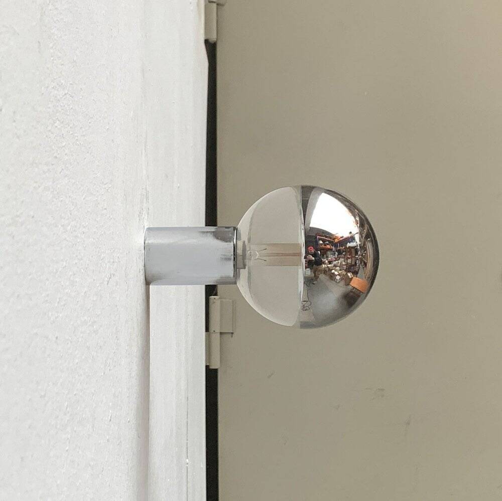 Vintage wall lamp from the German space age by Motoko Ishii for Staff, 1970s.