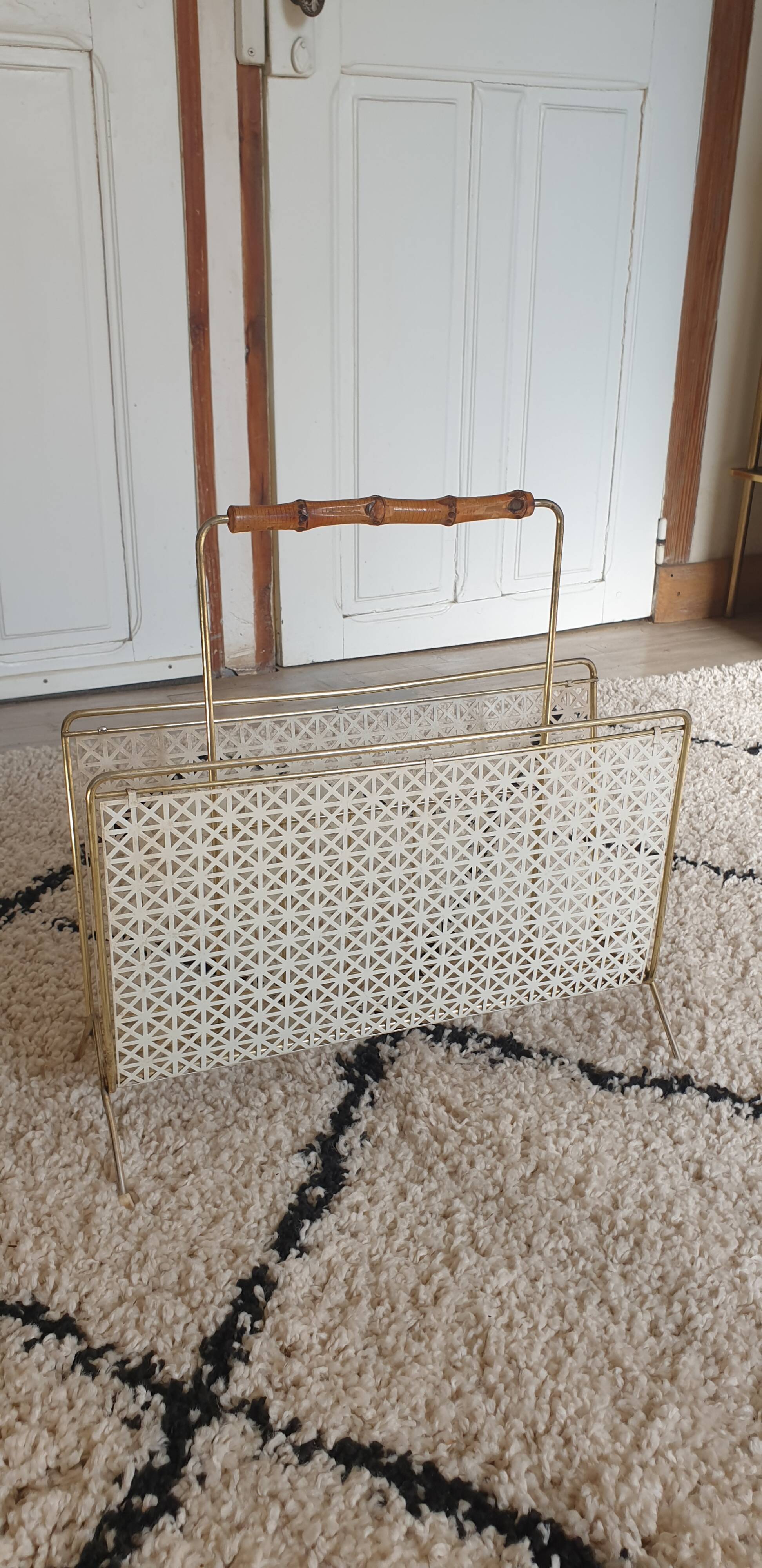 Perforated metal review door