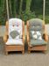 2 rattan and woven wicker armchairs in vintage 70s style