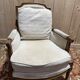 Paire de fauteuil / bergères de style Louis XVI beige