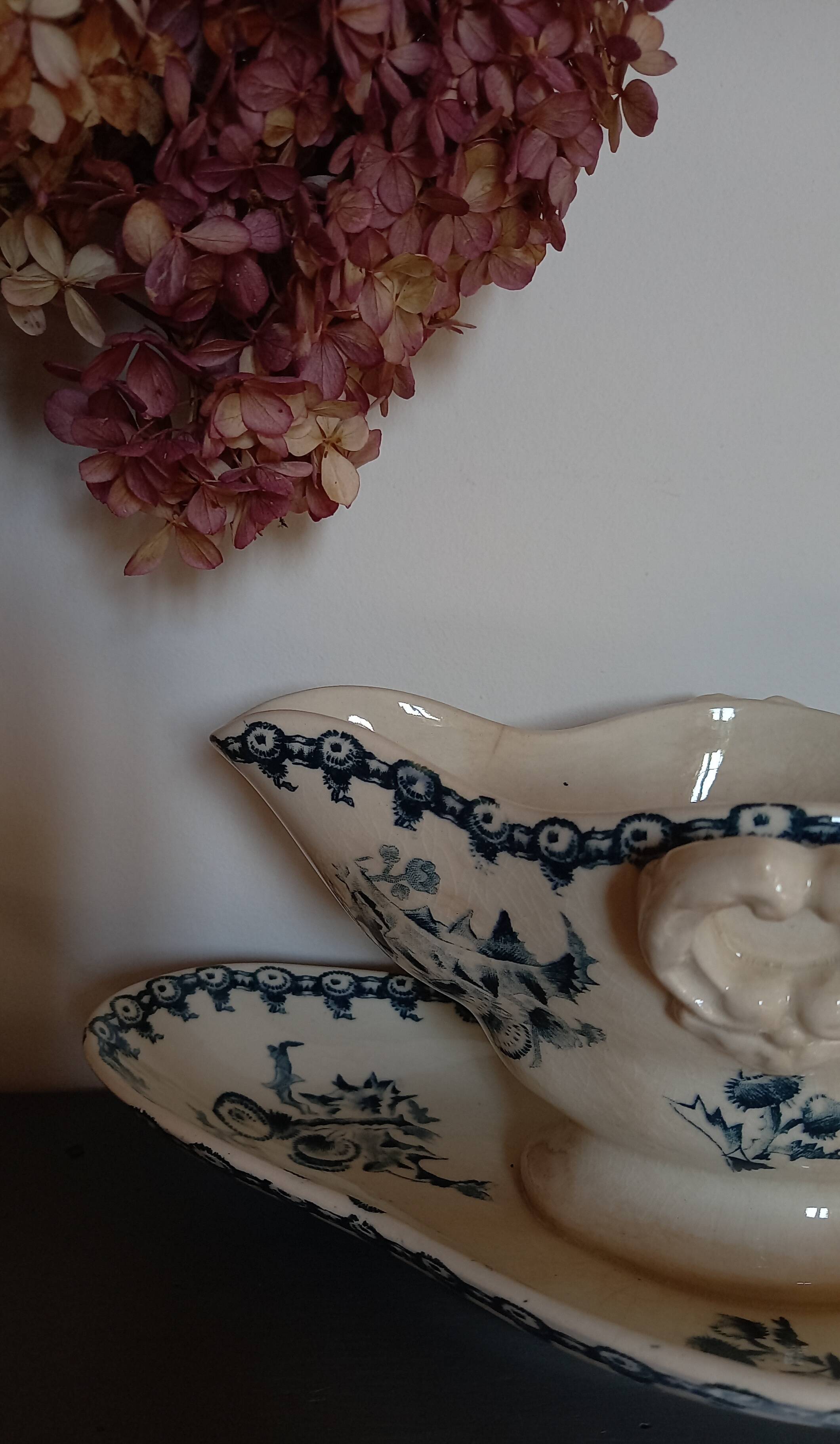 Old gravy boat on frame in terre de fer earthenware by gien, “chardons” model in blue-green