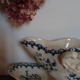 Old gravy boat on frame in terre de fer earthenware by gien, “chardons” model in blue-green