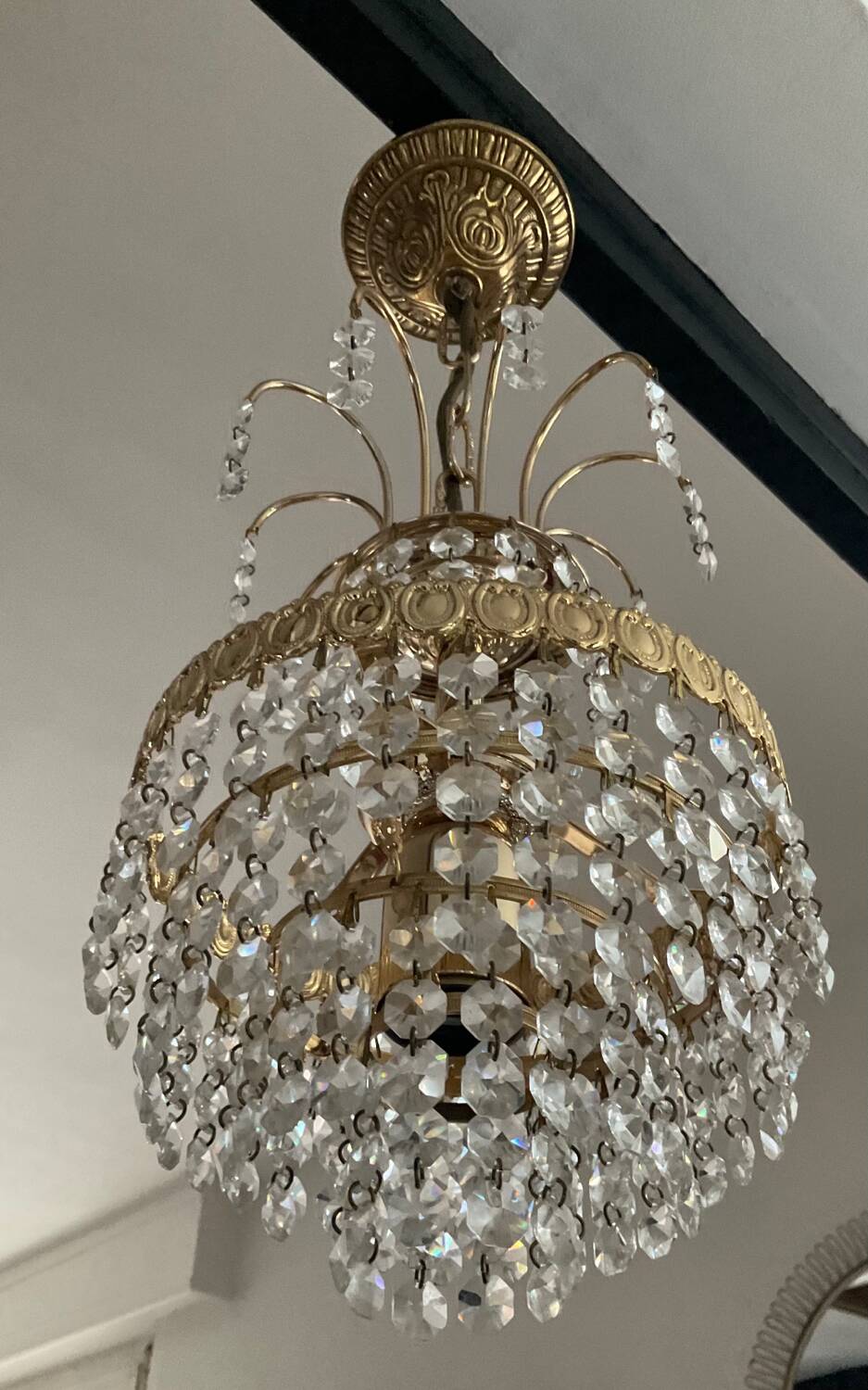 Cascade chandelier with crystal and brass tassels