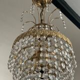 Cascade chandelier with crystal and brass tassels