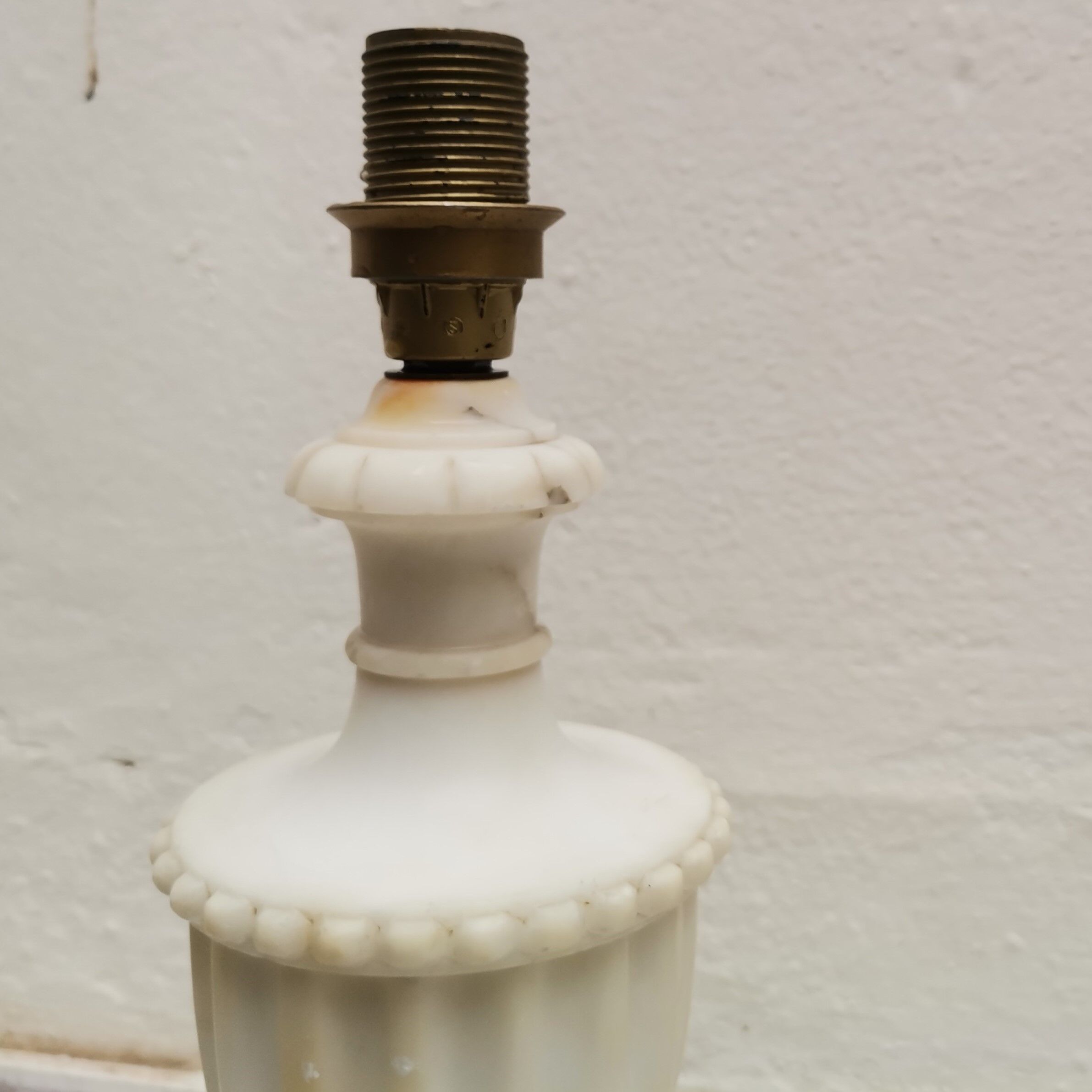 White marble amphora shaped table lamp