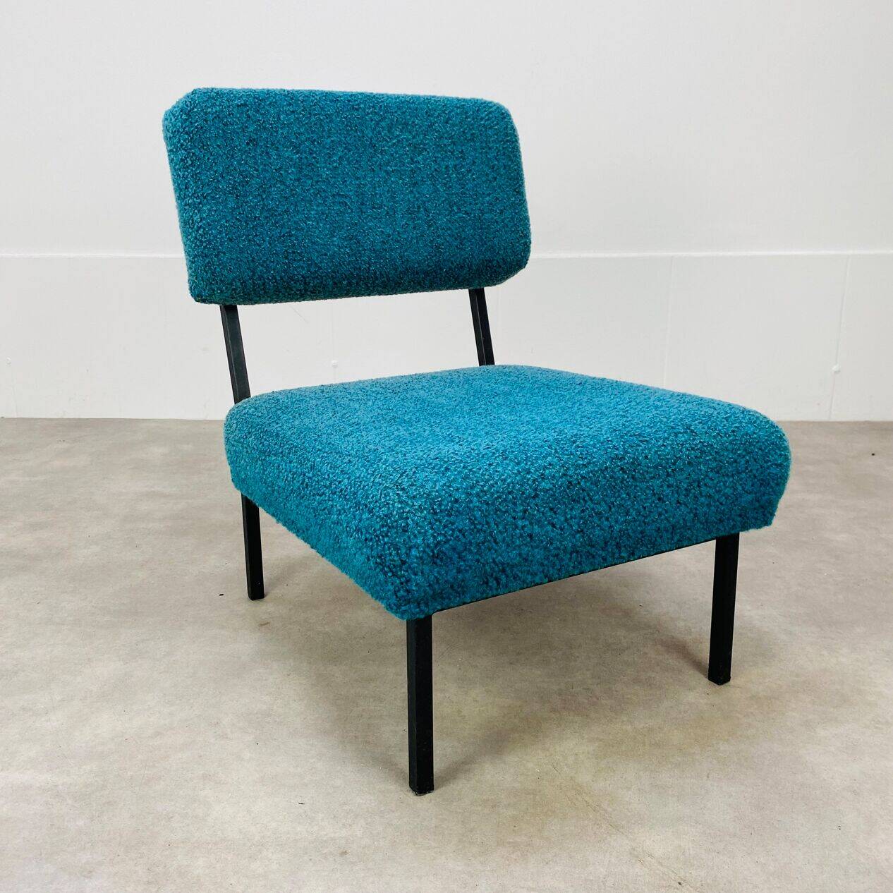 Modernist armchair from the 1950s in vintage blue boucle fabric.
