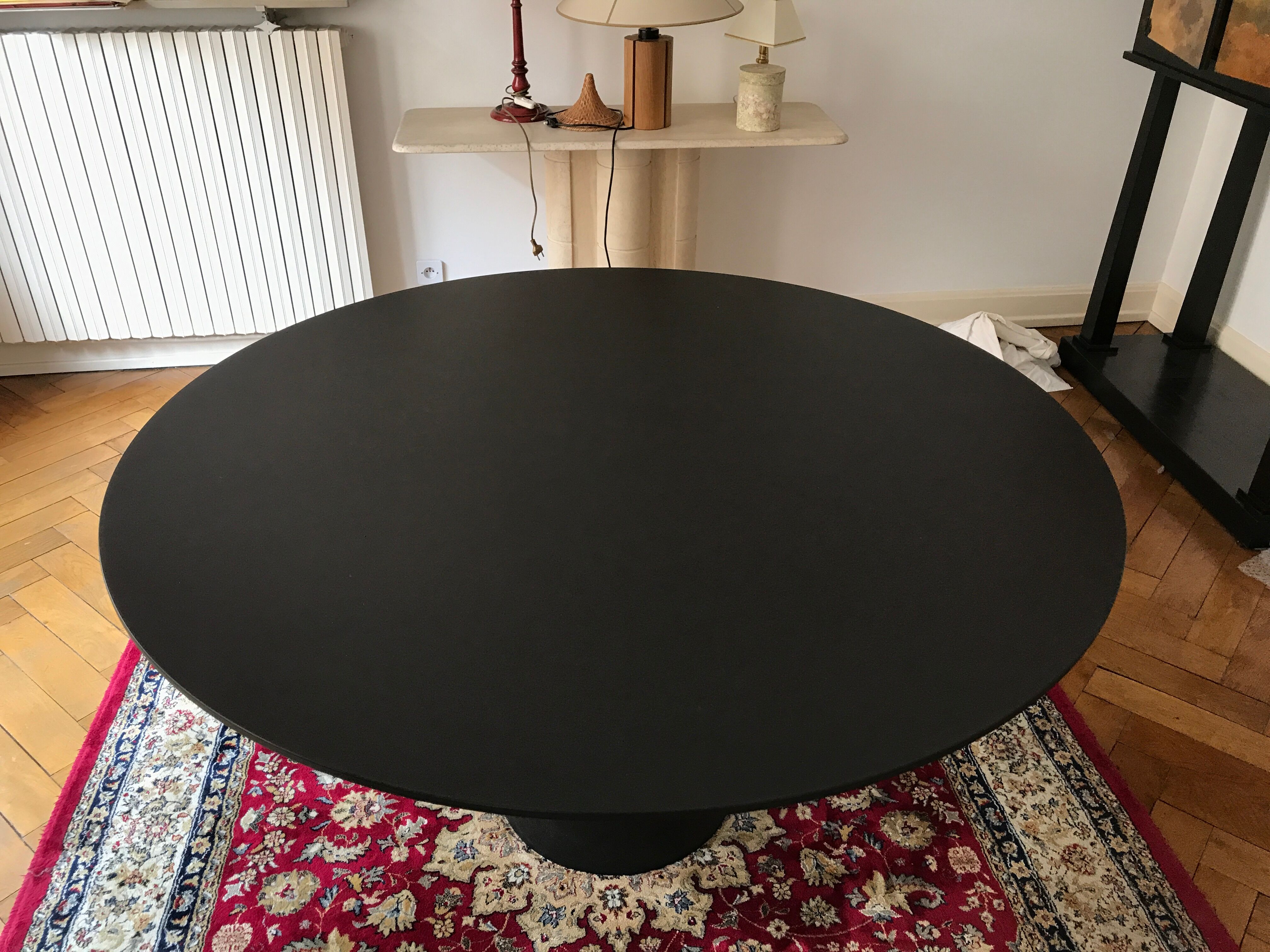 Original black wide-footed dining table