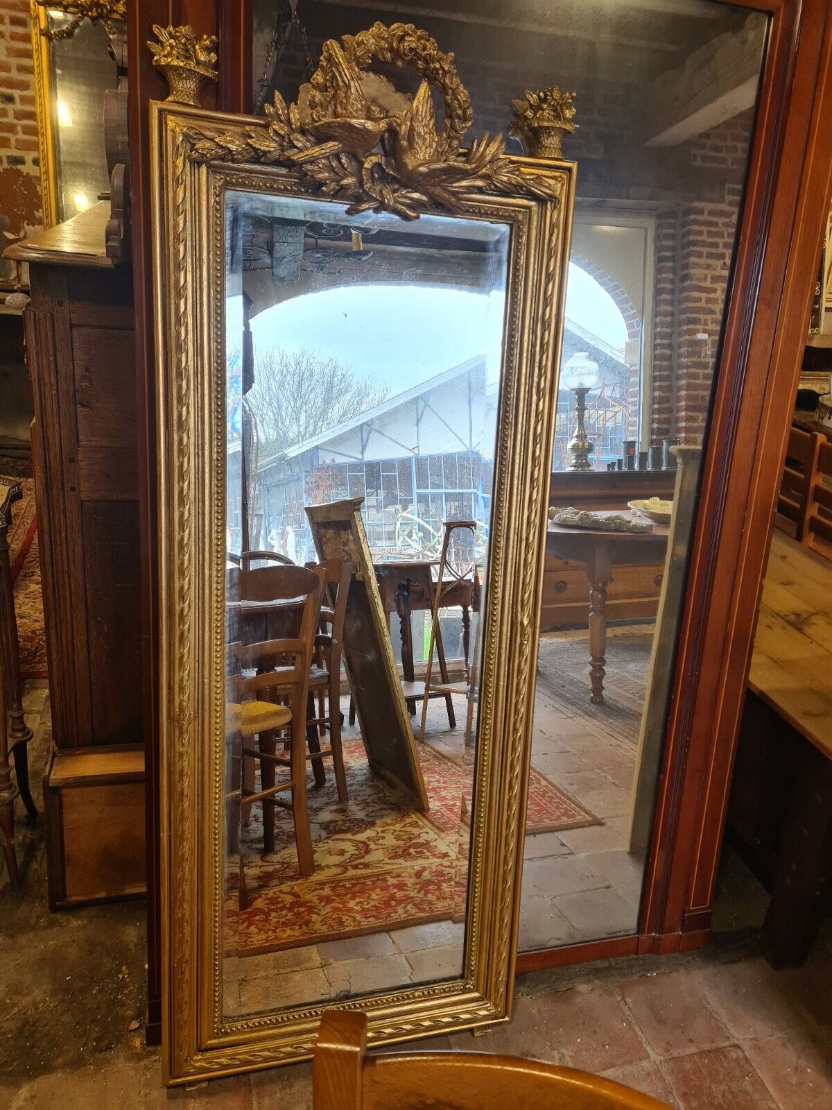 Golden mirror with doves