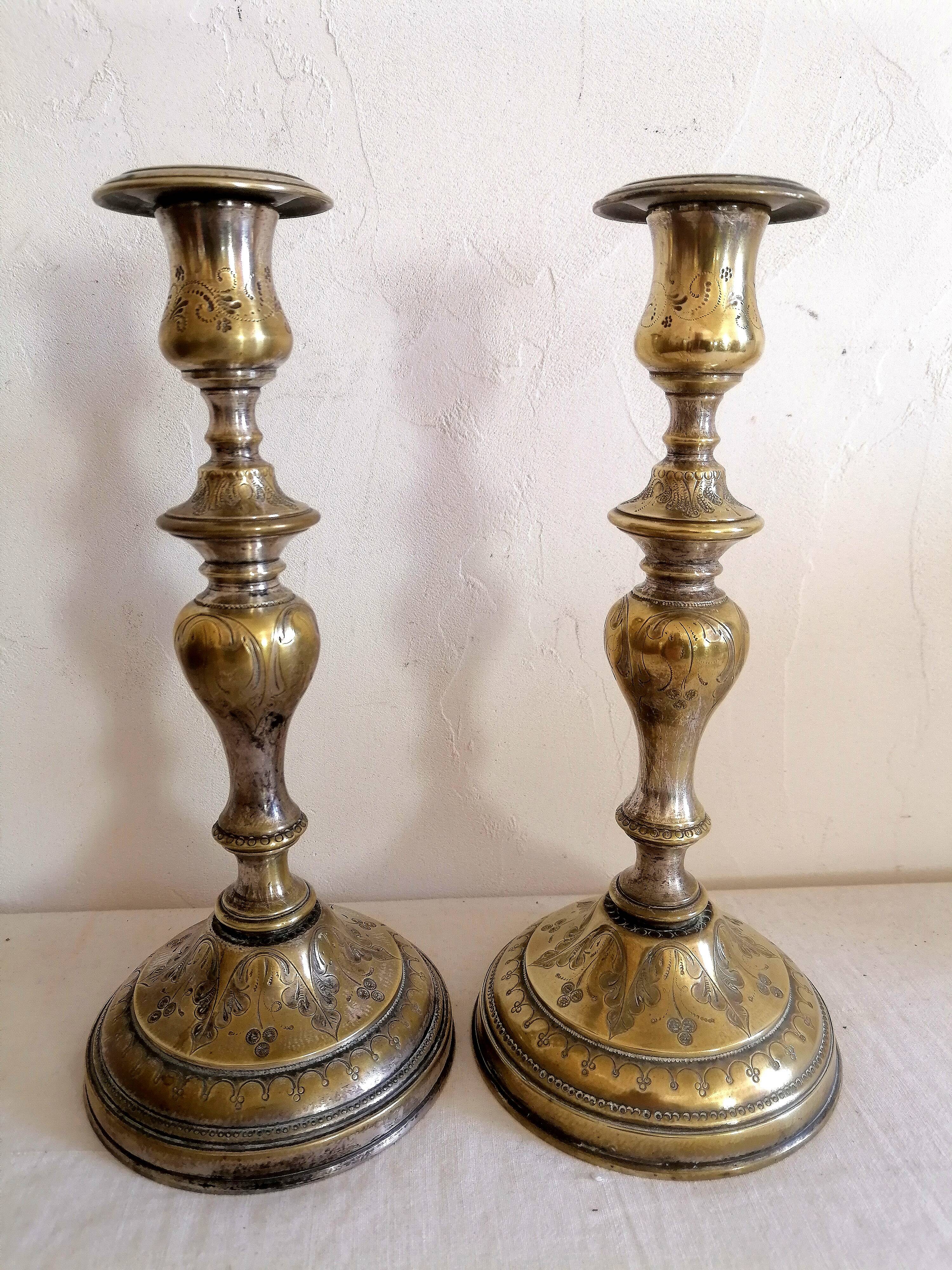 Old pair of Louis Philippe period candlesticks.