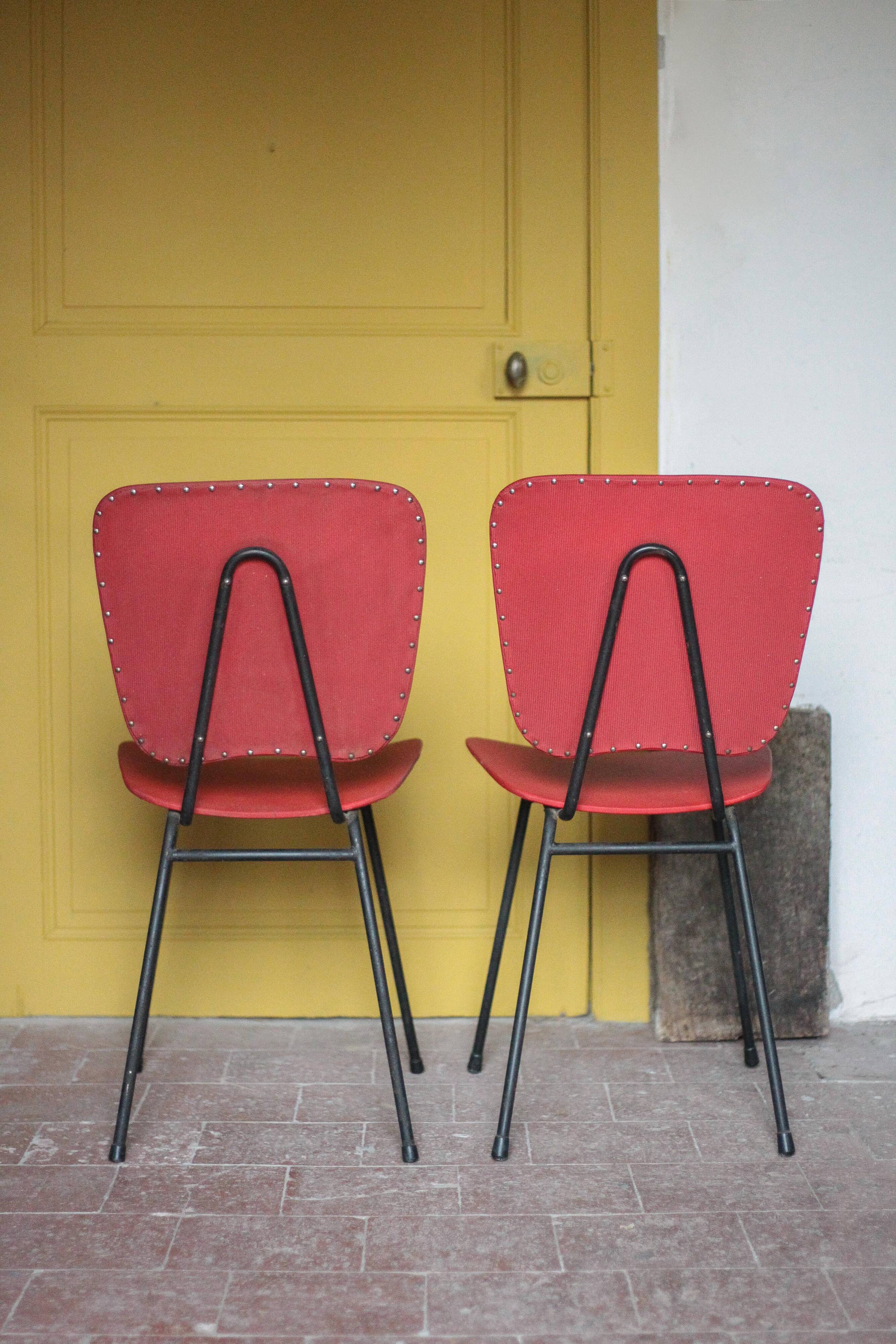 Pair of wooden and faux leather chairs from the 1950s, vintage chairs, retro.