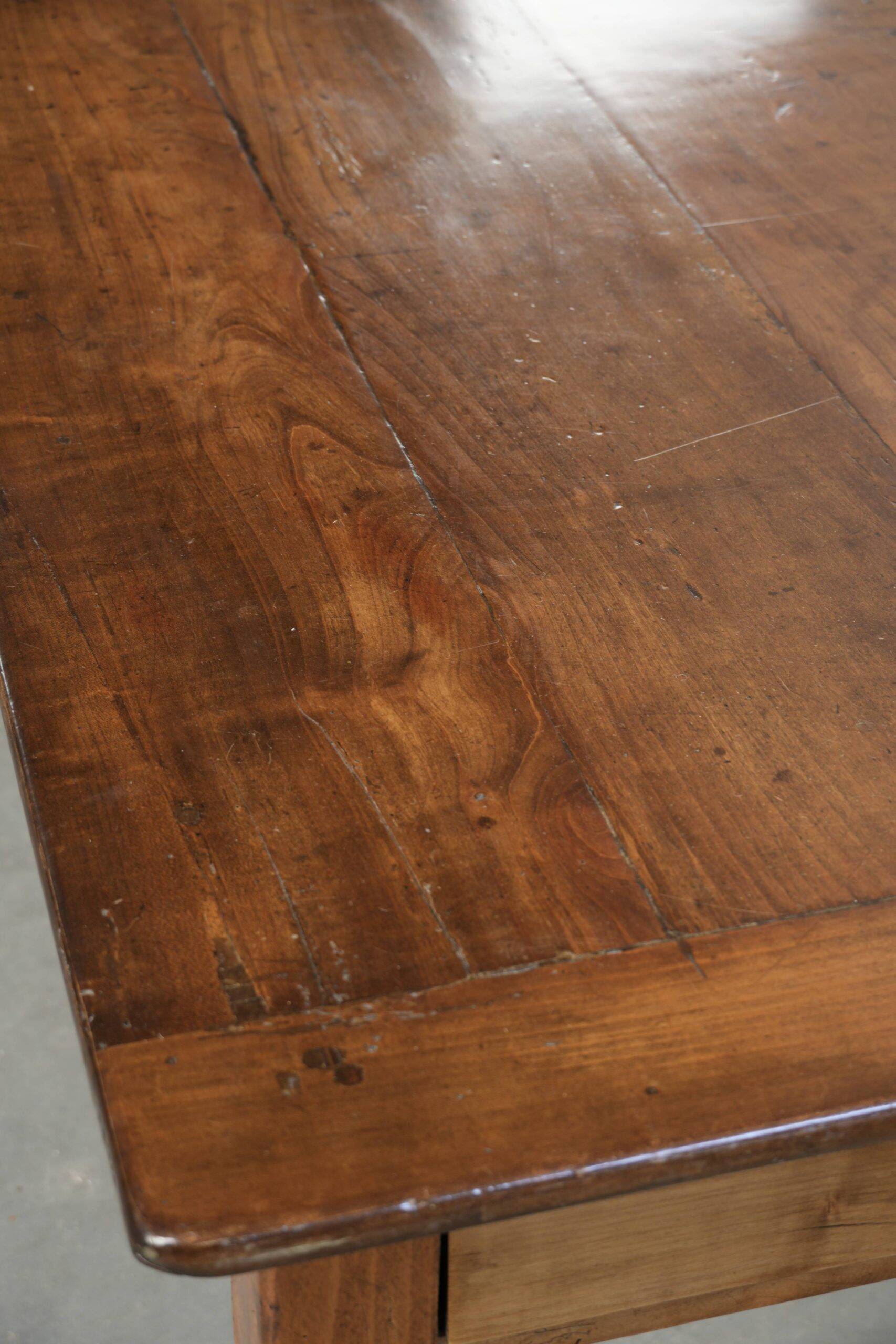 Antique French cherry wood dining table from the 19th century