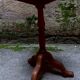 Old wooden gueridon, three-legged column