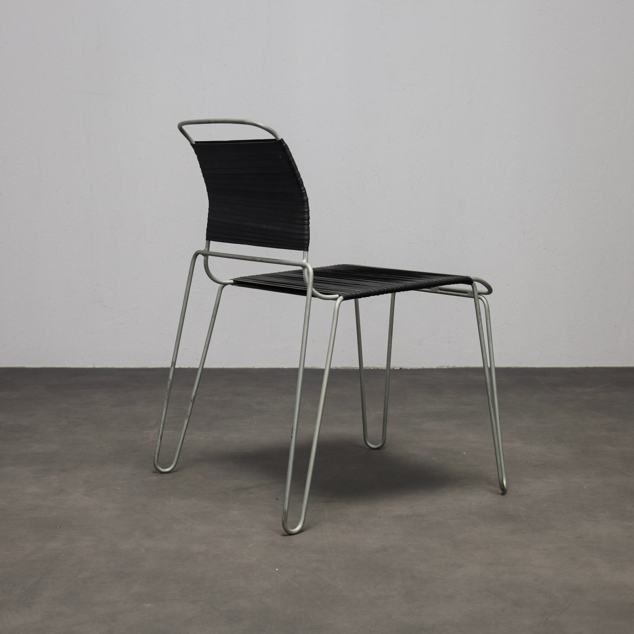 Rare pair of “Rubber Band” chairs by Tom Dixon