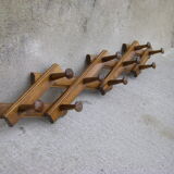 Old accordion coat rack