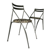 Pair of folding chairs from the 80s with leopard print seats.